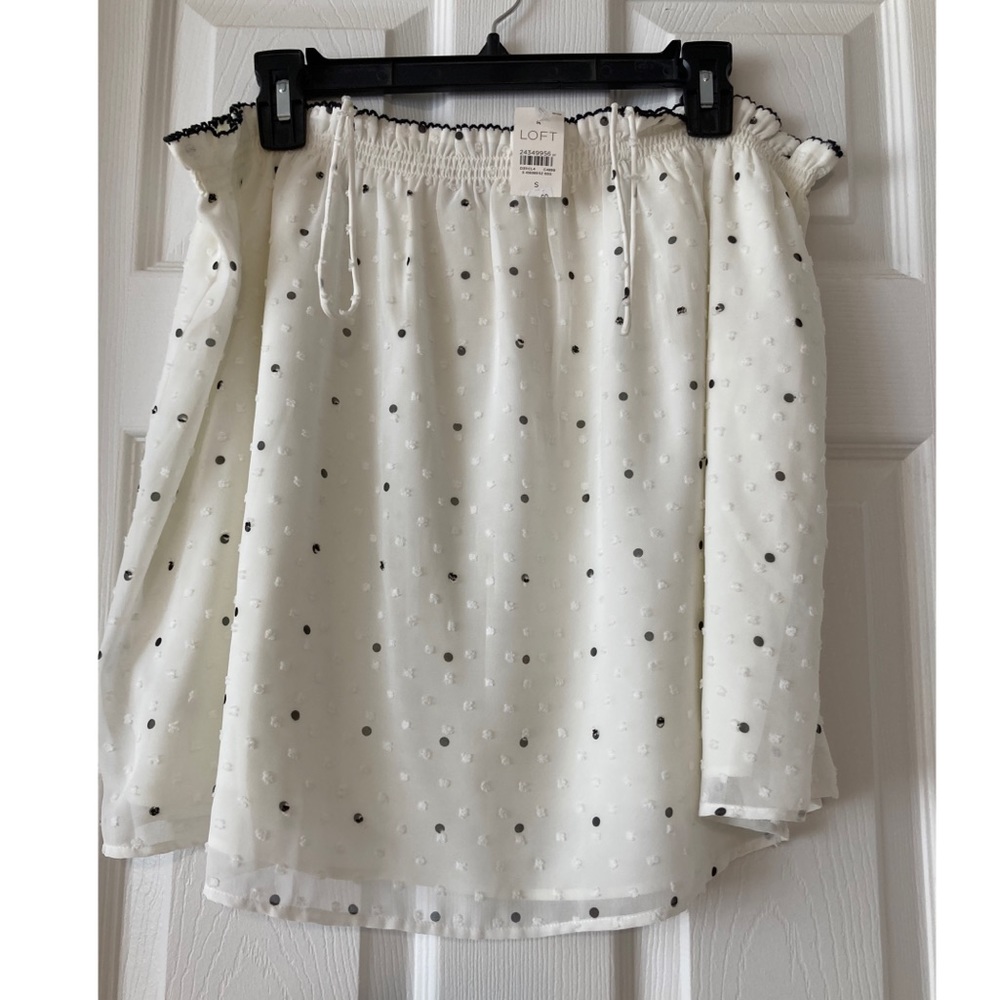 White tank top with black polka dots
